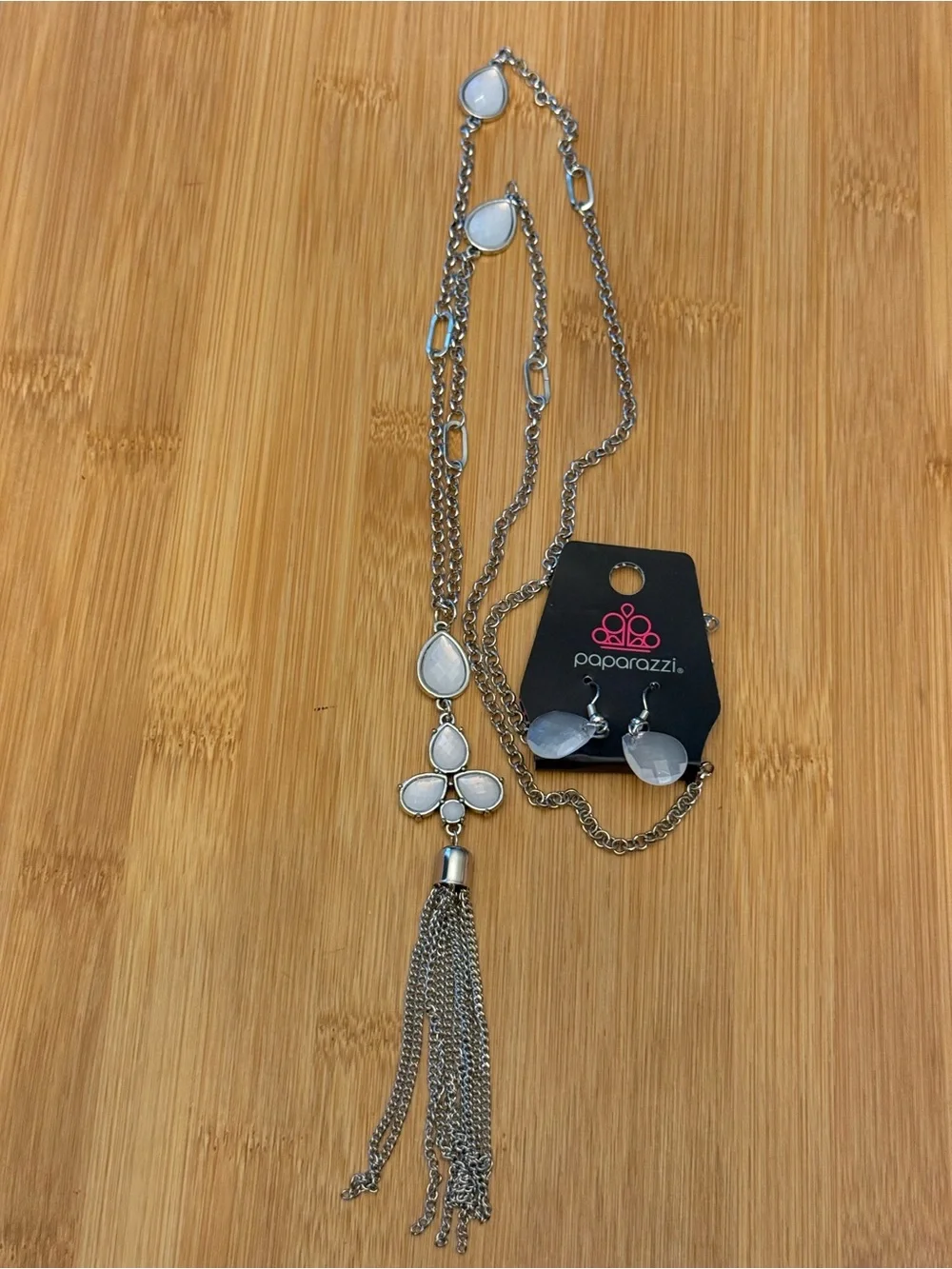 Silver Tone Tassel Pendant Necklace with White Teardrop Accents